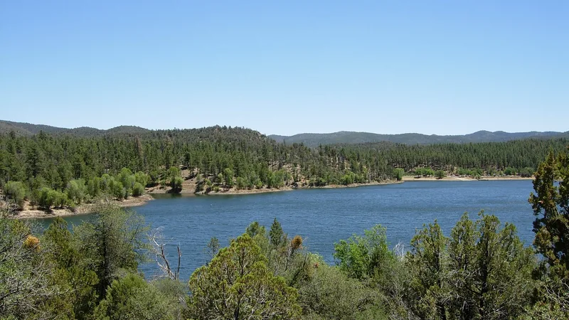 Lynx Lake surrounded by pine-covered hills in the Prescott National Forest